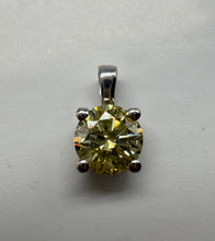 Load image into Gallery viewer, Pendant in 14 ct. white gold holding one 0,52 ct. natural diamond