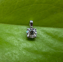 Load image into Gallery viewer, Pendant in 14 ct. white gold holding one 0,50 ct. natural diamond
