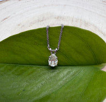 Load image into Gallery viewer, Necklace in 14 ct. white gold with a 0,82 ct. diamond pendant.