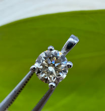Load image into Gallery viewer, Pendant in 14 ct. white gold holding one 0,50 ct. natural diamond