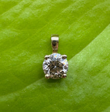 Load image into Gallery viewer, Pendant in 14 ct. gold holding one 0,50 ct. natural diamond