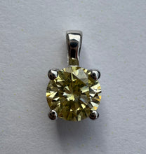 Load image into Gallery viewer, Pendant in 14 ct. white gold holding one 0,52 ct. natural diamond