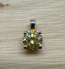 Load image into Gallery viewer, Pendant in 14 ct. white gold holding one 0,52 ct. natural diamond
