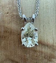 Load image into Gallery viewer, Necklace in 14 ct. white gold with a 0,82 ct. diamond pendant.
