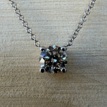 Load image into Gallery viewer, Necklace in 14 ct. white gold holding one 0,50 ct. natural diamond