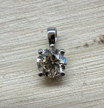 Load image into Gallery viewer, Pendant in 14 ct. white gold holding one 0,50 ct. natural diamond