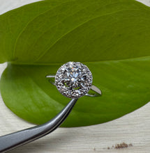 Load image into Gallery viewer, Halo ring in 14 ct. white gold holding 0,96 tcw. natural diamonds