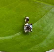Load image into Gallery viewer, Pendant in 14 ct. gold holding one 0,50 ct. natural diamond