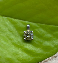 Load image into Gallery viewer, Pendant in 14 ct. white gold holding one 0,52 ct. natural diamond
