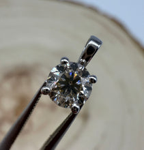Load image into Gallery viewer, Pendant in 14 ct. white gold holding one 0,50 ct. natural diamond