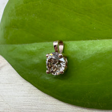 Load image into Gallery viewer, Pendant in 14 ct. rose gold holding one 0,51 ct. natural diamond