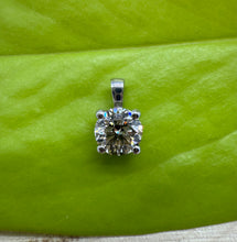 Load image into Gallery viewer, 14 ct. white gold pendant with a 0,60 ct. natural diamond