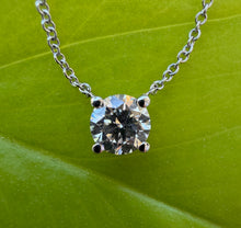 Load image into Gallery viewer, Necklace in 14 ct. white gold holding one 0,50 ct. natural diamond