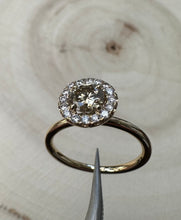 Load image into Gallery viewer, Halo ring in 14 ct. gold with 0,69 tcw. natural diamonds