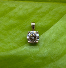 Load image into Gallery viewer, Pendant in 14 ct. gold holding one 0,50 ct. natural diamond