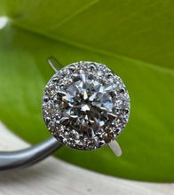 Load image into Gallery viewer, Halo ring in 14 ct. white gold holding 0,96 tcw. natural diamonds
