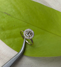 Load image into Gallery viewer, Halo ring in 14 ct. gold with 0,69 tcw. natural diamonds
