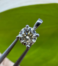 Load image into Gallery viewer, Pendant in 14 ct. white gold holding one 0,50 ct. natural diamond
