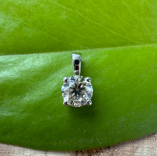 Load image into Gallery viewer, Pendant in 14 ct. white gold holding one 0,50 ct. natural diamond

