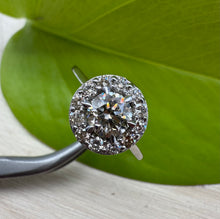 Load image into Gallery viewer, Halo ring in 14 ct. white gold holding 0,96 tcw. natural diamonds
