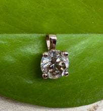 Load image into Gallery viewer, Pendant in 14 ct. rose gold holding one 0,51 ct. natural diamond
