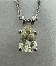 Load image into Gallery viewer, Necklace in 14 ct. white gold with a 0,82 ct. diamond pendant.

