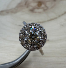 Load image into Gallery viewer, Halo ring in 14 ct. white gold holding 0,96 tcw. natural diamonds
