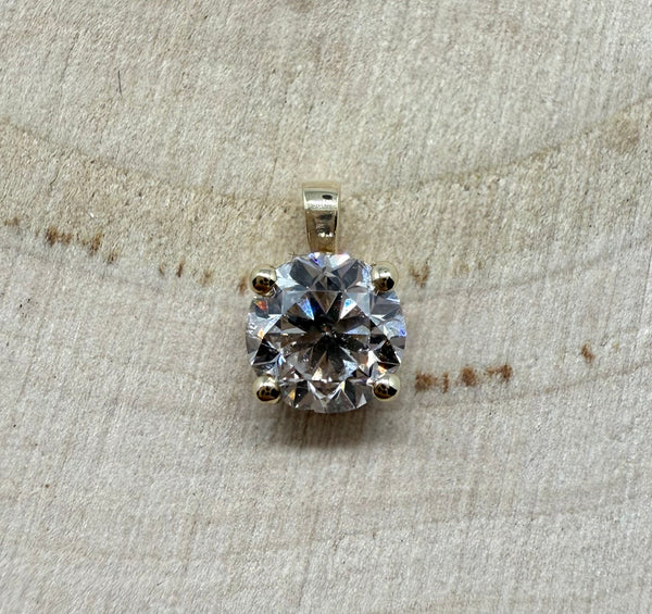 14 ct. gold pendant with 1,00 ct. natural diamond