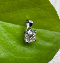 Load image into Gallery viewer, Pendant in 14 ct. white gold holding one 0,50 ct. natural diamond

