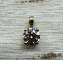 Load image into Gallery viewer, Pendant in 14 ct. gold holding one 0,50 ct. natural diamond
