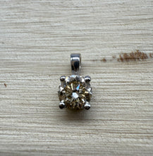 Load image into Gallery viewer, Pendant in 14 ct. white gold holding one 0,50 ct. natural diamond
