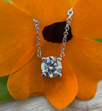 Load image into Gallery viewer, Necklace in 14 ct. white gold holding one 0,50 ct. natural diamond
