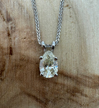 Load image into Gallery viewer, Necklace in 14 ct. white gold with a 0,82 ct. diamond pendant.
