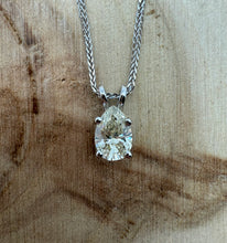 Load image into Gallery viewer, Necklace in 14 ct. white gold with a 0,82 ct. diamond pendant.
