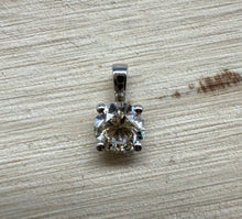Load image into Gallery viewer, Pendant in 14 ct. white gold holding one 0,50 ct. natural diamond
