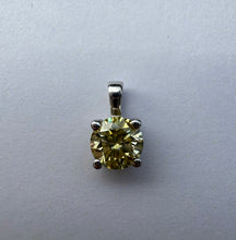 Load image into Gallery viewer, Pendant in 14 ct. white gold holding one 0,52 ct. natural diamond
