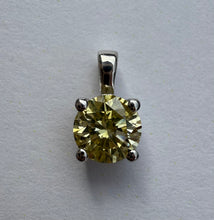 Load image into Gallery viewer, Pendant in 14 ct. white gold holding one 0,52 ct. natural diamond
