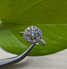 Load image into Gallery viewer, Halo ring in 14 ct. white gold holding 0,96 tcw. natural diamonds
