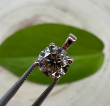 Load image into Gallery viewer, Pendant in 14 ct. rose gold holding one 0,51 ct. natural diamond
