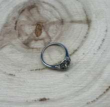 Load image into Gallery viewer, Halo ring in 14 ct. white gold holding 0,96 tcw. natural diamonds

