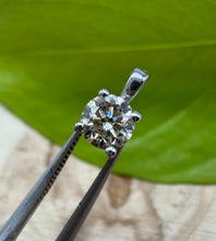 Load image into Gallery viewer, Pendant in 14 ct. white gold holding one 0,50 ct. natural diamond
