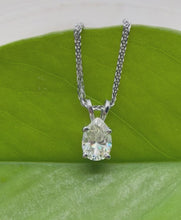 Load and play video in Gallery viewer, Necklace in 14 ct. white gold with a 0,82 ct. diamond pendant.
