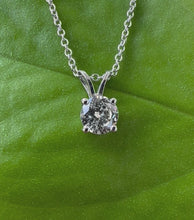 Load and play video in Gallery viewer, 14 ct. white gold necklace with 0,44 ct. diamond pendant
