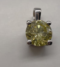 Load and play video in Gallery viewer, Pendant in 14 ct. white gold holding one 0,52 ct. natural diamond
