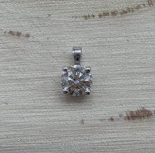 Load and play video in Gallery viewer, 14 ct. white gold pendant with a 0,60 ct. natural diamond
