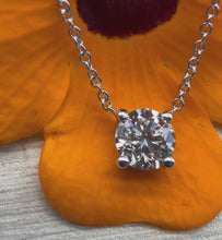 Load and play video in Gallery viewer, 14 ct. white gold necklace with one 0,50 ct. natural diamond
