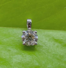 Load and play video in Gallery viewer, Pendant in 14 ct. white gold holding one 0,50 ct. natural diamond
