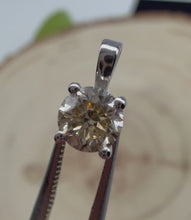 Load and play video in Gallery viewer, Pendant in 14 ct. white gold holding one 0,50 ct. natural diamond
