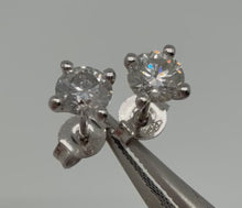 Load and play video in Gallery viewer, Stud earrings in 14 ct. white gold with 0,60 tcw. diamonds
